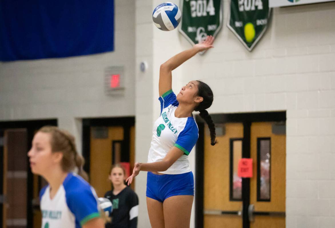 Green Valley’s Ensilina Savelio (6) serves the ball during a volleyball game at Palo Ver ...