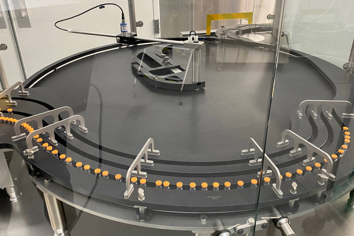 This photo provided by Pfizer in October 2022 shows manufacturing of the company's COVID-19 biv ...