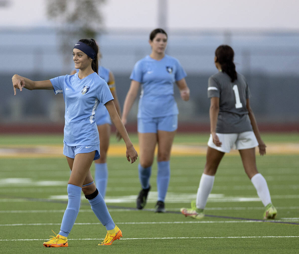 Foothill’s Madison Ybarra, left, signals to her teammates on the bench after her team wo ...