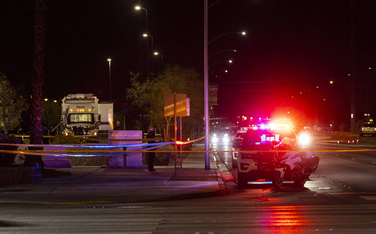 North Las Vegas police investigate the scene of an officer-involved shooting at Martin Luther K ...