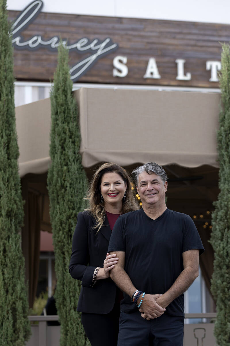 Owners of Honey Salt, married couple Elizabeth Blau and chef Kim Canteenwalla, outside their re ...