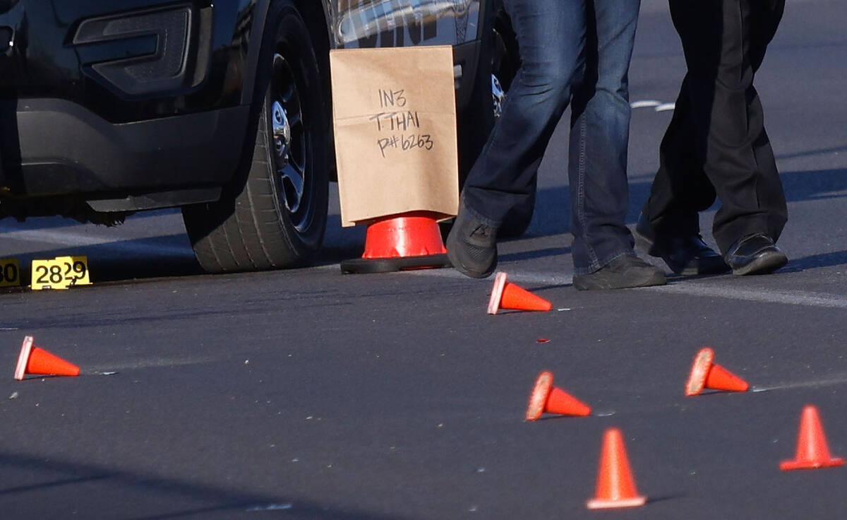 Orange cones are seen while Las Vegas police investigate around 800 block of East Flamingo Road ...