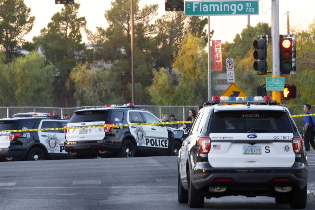 Las Vegas police investigate around the 800 block of East Flamingo Road after a shooting on Thu ...