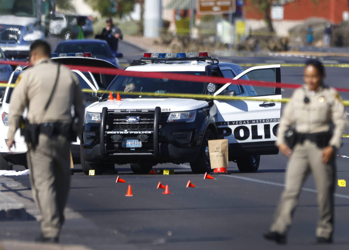 Las Vegas police investigate the scene on East Flamingo Road after a shooting that fatally woun ...