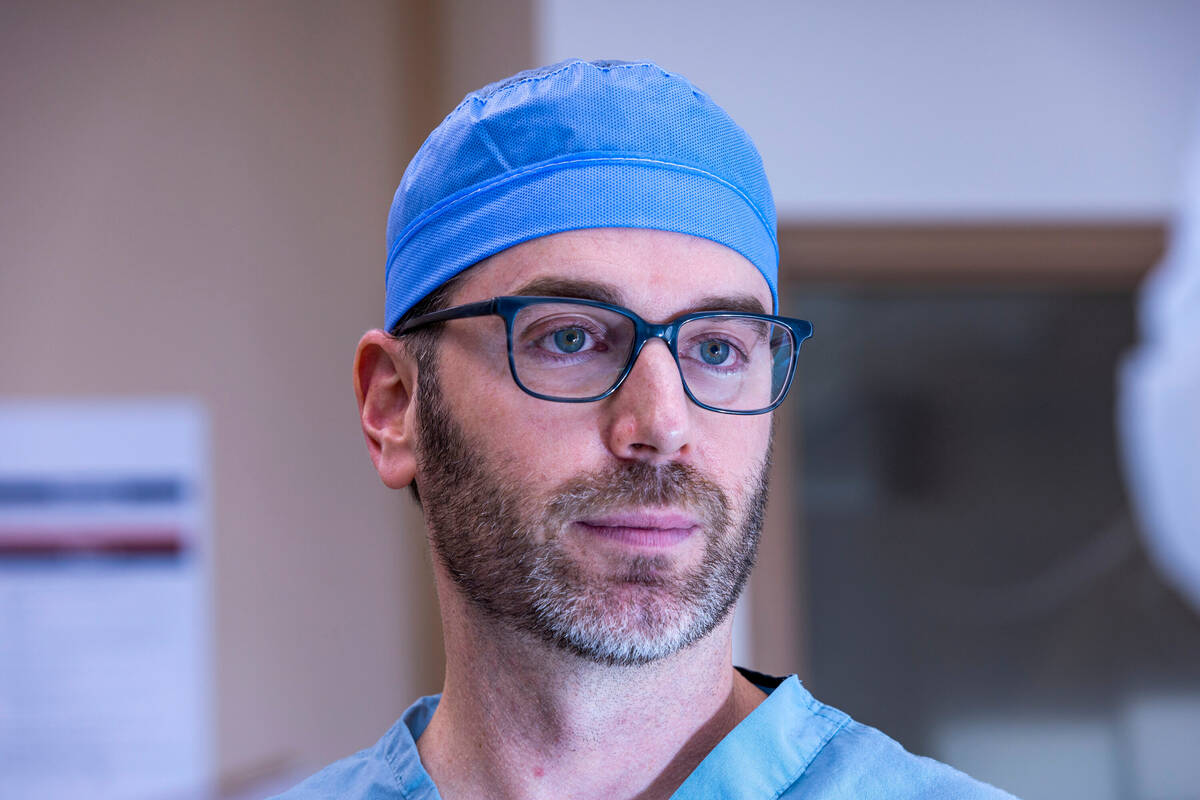 Dr. Garrett Friedman is seen in an operating room of the Las Vegas Institute for Robotic Surger ...