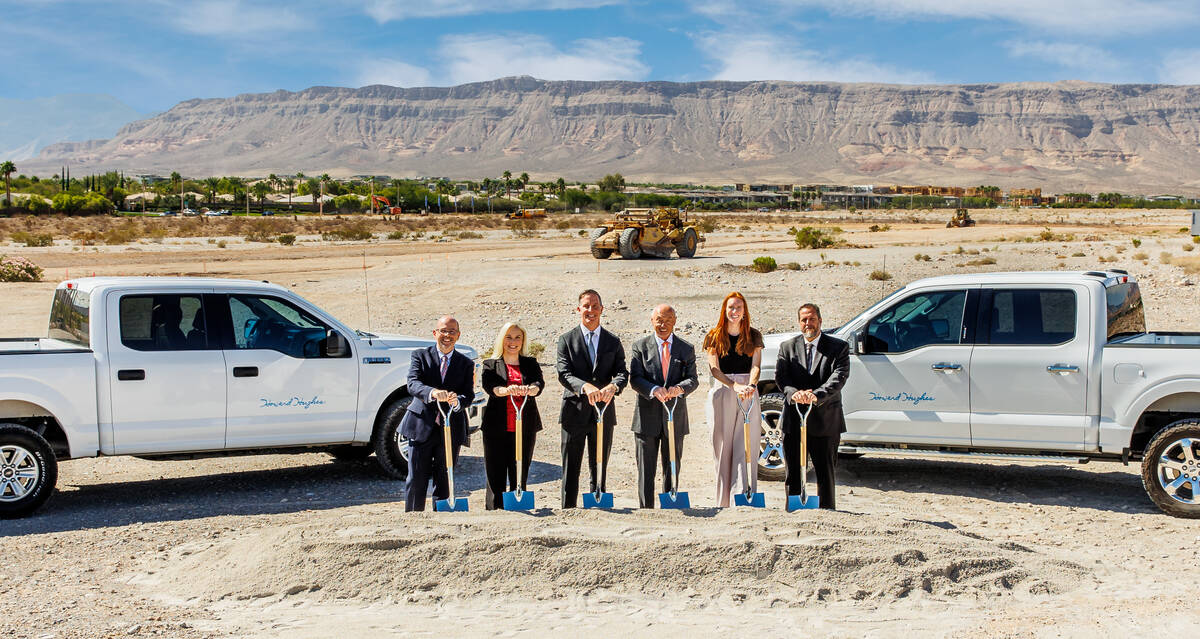 Executives with Summerlin developer Howard Hughes Corp. hold a ceremonial groundbreaking for tw ...