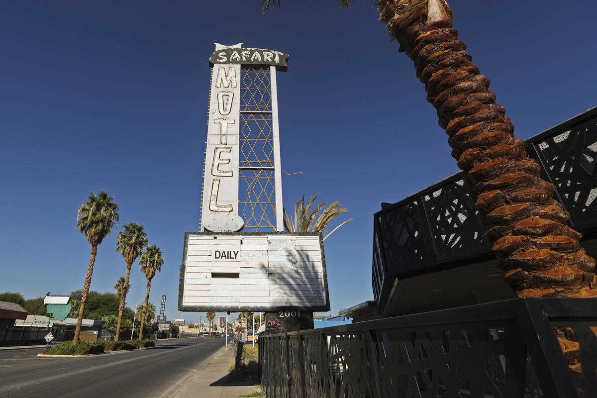 Signage is seen during a look at former Safari Motel, which is being converted to a bridge hous ...