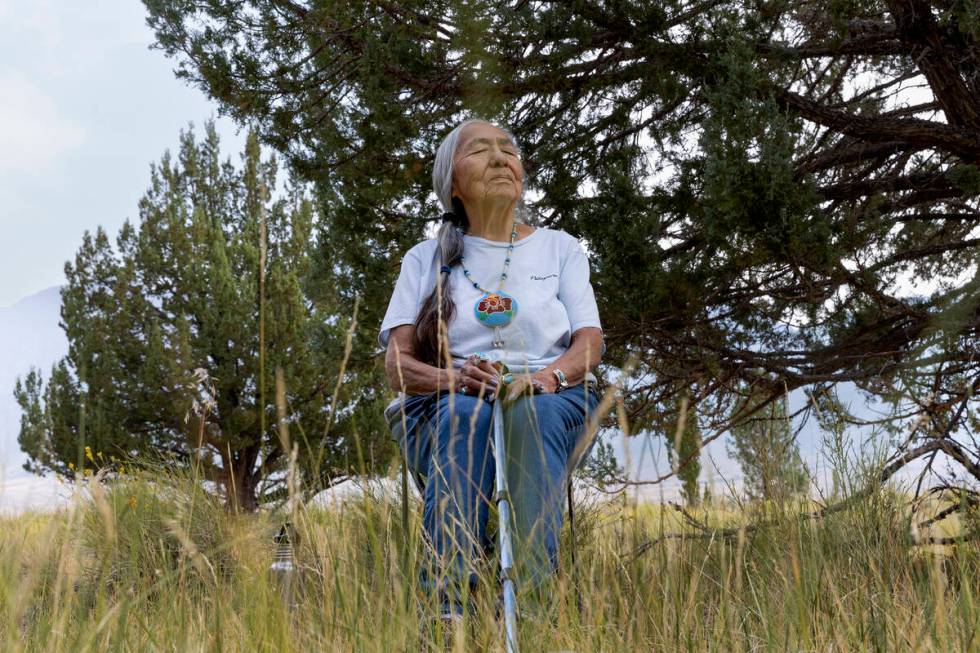 Delaine Spilsbury, an Ely Shoshone tribal elder, takes a moment while visiting swamp cedars, a ...