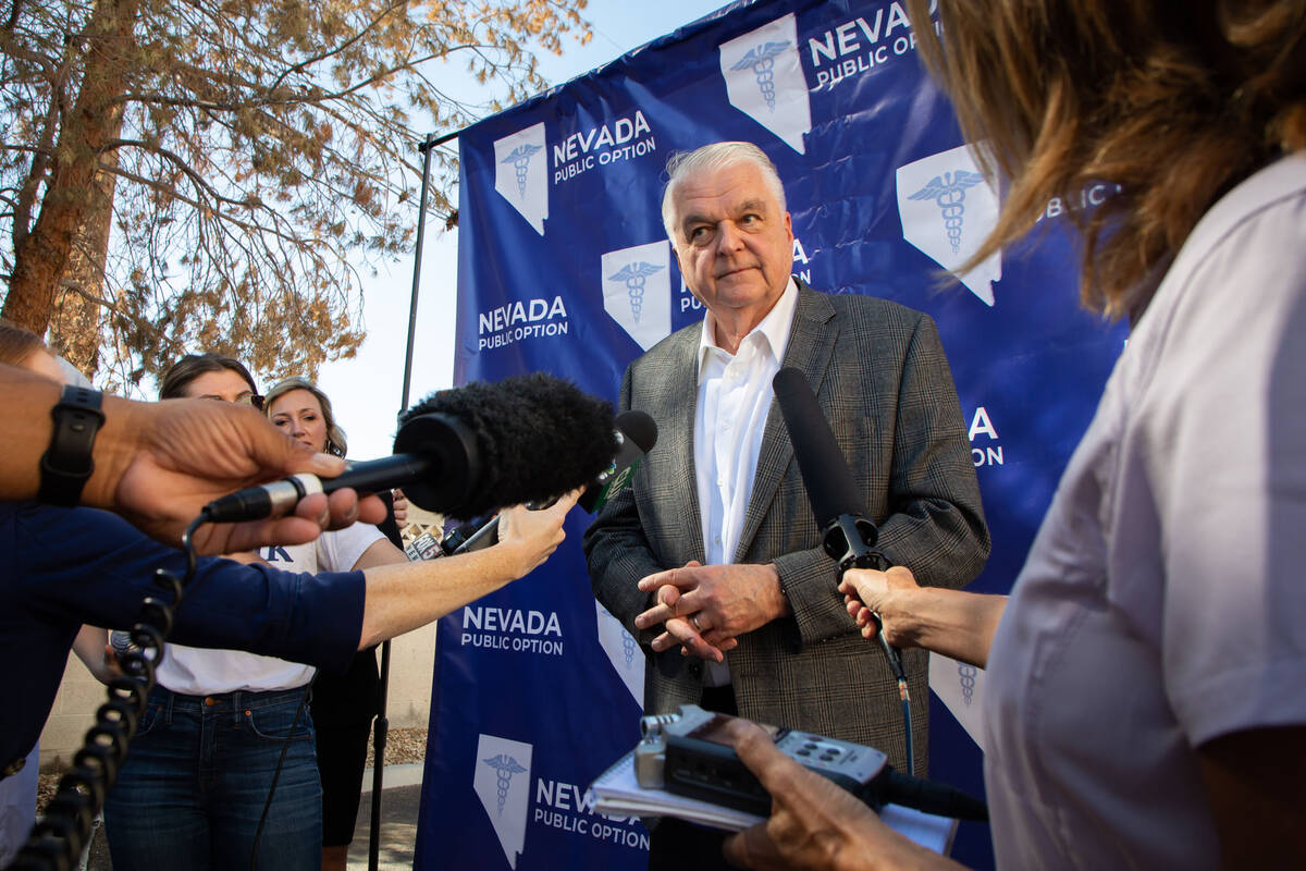 Gov. Steve Sisolak answers questions after a press conference on Thursday, Oct. 13, 2022, in La ...