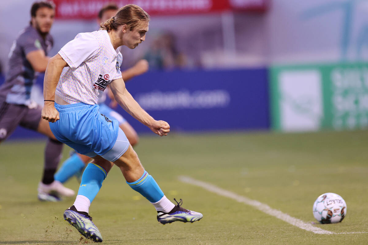 Las Vegas Lights Cal Jennings (26) takes a shot for a score against the Tacoma Defiance in the ...