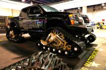 A rubber track made by GMC is displayed during Big Boys Toys Innovation and Luxury Lifestyle Ex ...