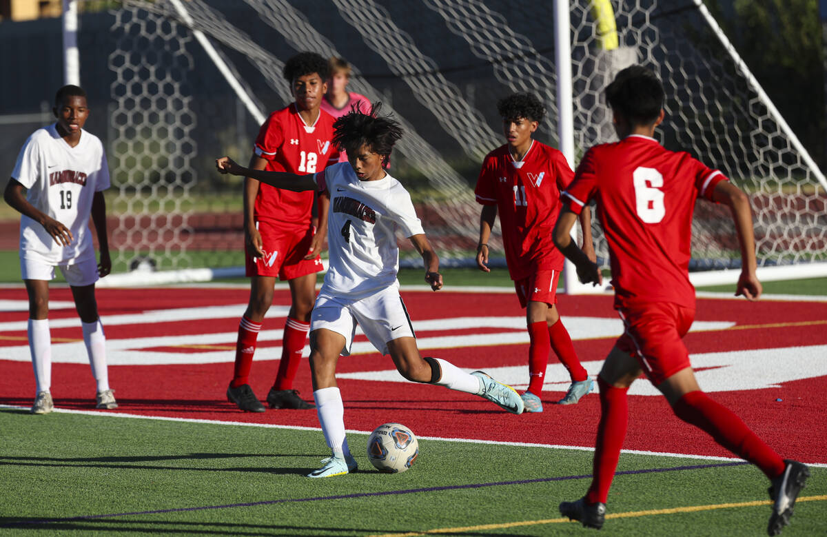 Desert Oasis' Michael Cruzado (4) kicks the ball during a soccer game at Western High School on ...