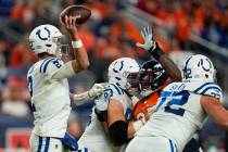 Indianapolis Colts quarterback Matt Ryan (2) passes against the Denver Broncos during an NFL fo ...