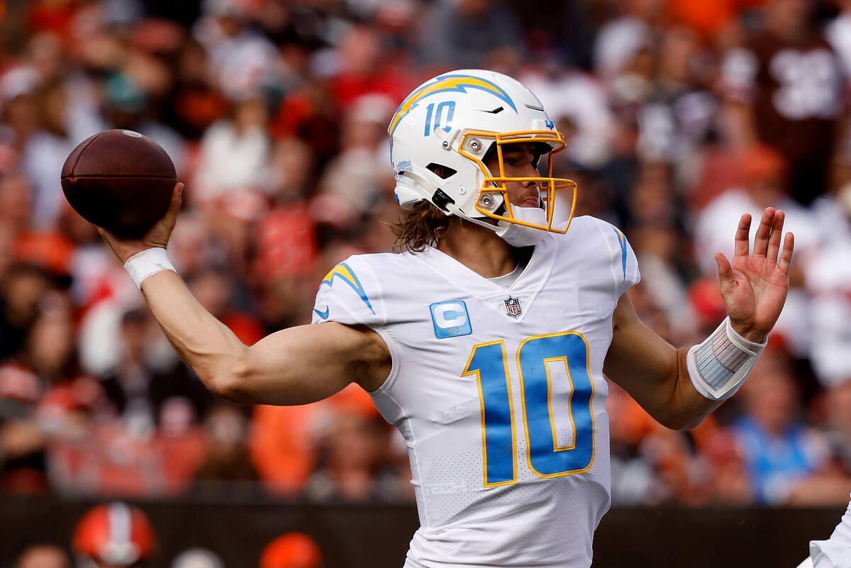Los Angeles Chargers quarterback Justin Herbert (10) throws the ball during an NFL football gam ...