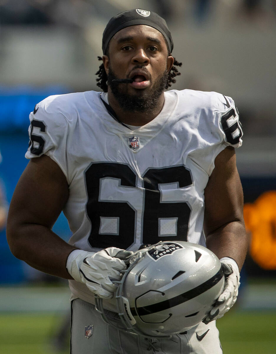 Raiders offensive lineman Dylan Parham (66) heads to the locker room at halftime during an NFL ...