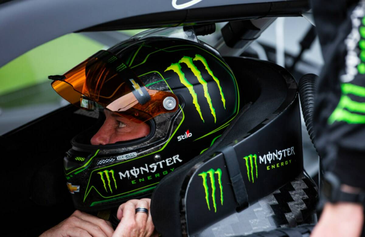Kurt Busch puts on his helmet before the start of a NASCAR Cup Series Pennzoil 400 auto race at ...