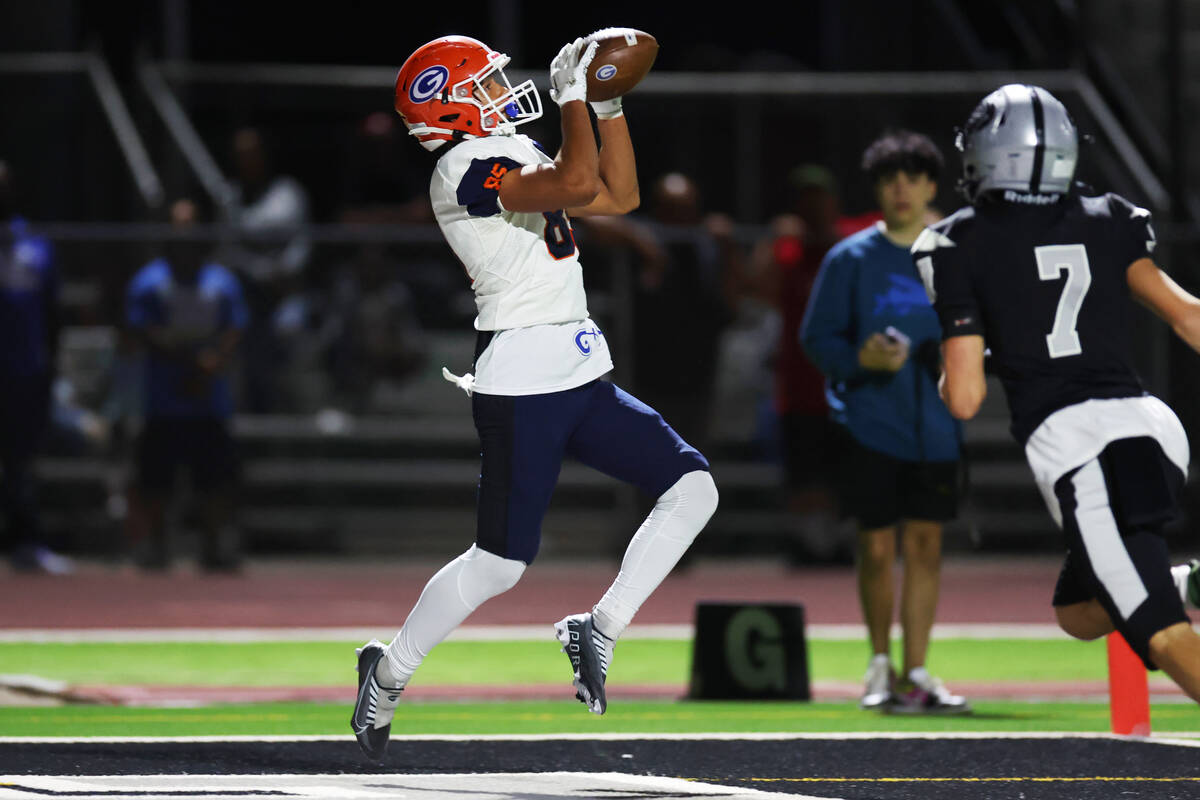 Bishop Gorman's Brandon Gaea (85) makes a touchdown catch during the first half of a football g ...
