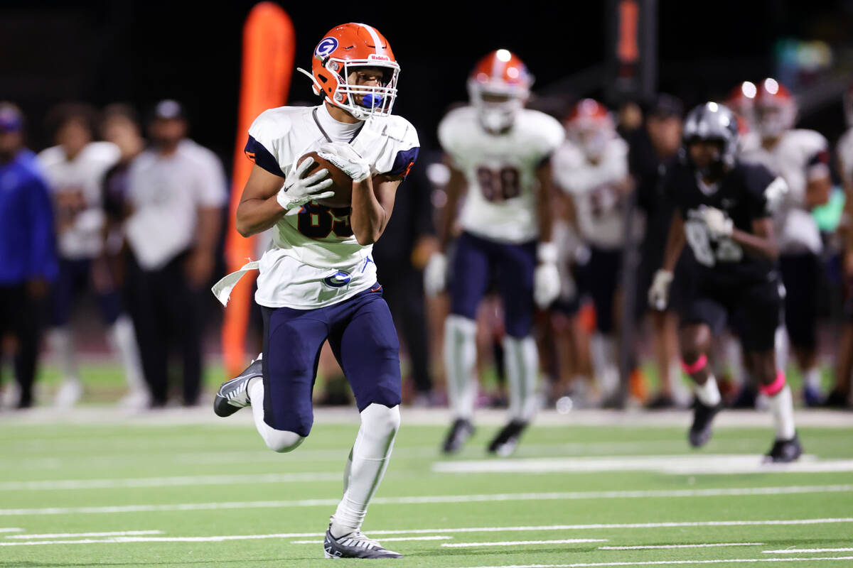 Bishop Gorman's Brandon Gaea (85) make a catch for a touchdown during the second half of a foot ...