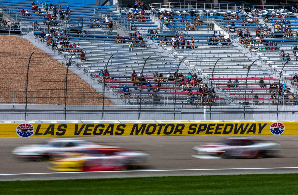 Cars make another lap during the Alsco Uniforms 302 NASCAR Xfinity Series Playoff Race at the L ...