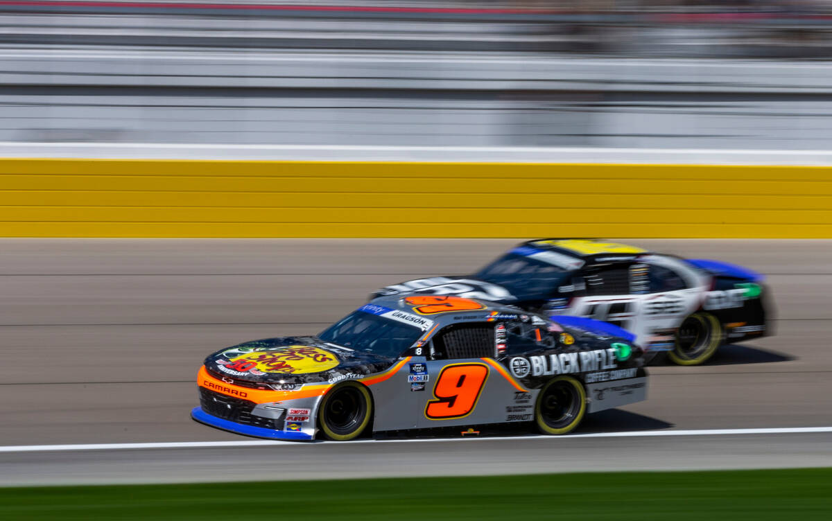 Noah Gragson (9) leads A.J. Allmendinger (16) during the Alsco Uniforms 302 NASCAR Xfinity Seri ...