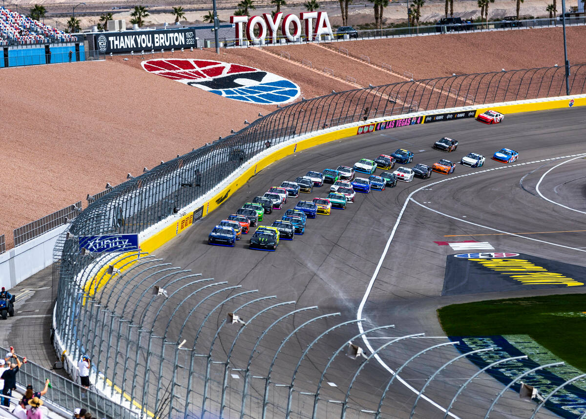 Cars bunch up at the start of stage 2 during the Alsco Uniforms 302 NASCAR Xfinity Series Playo ...