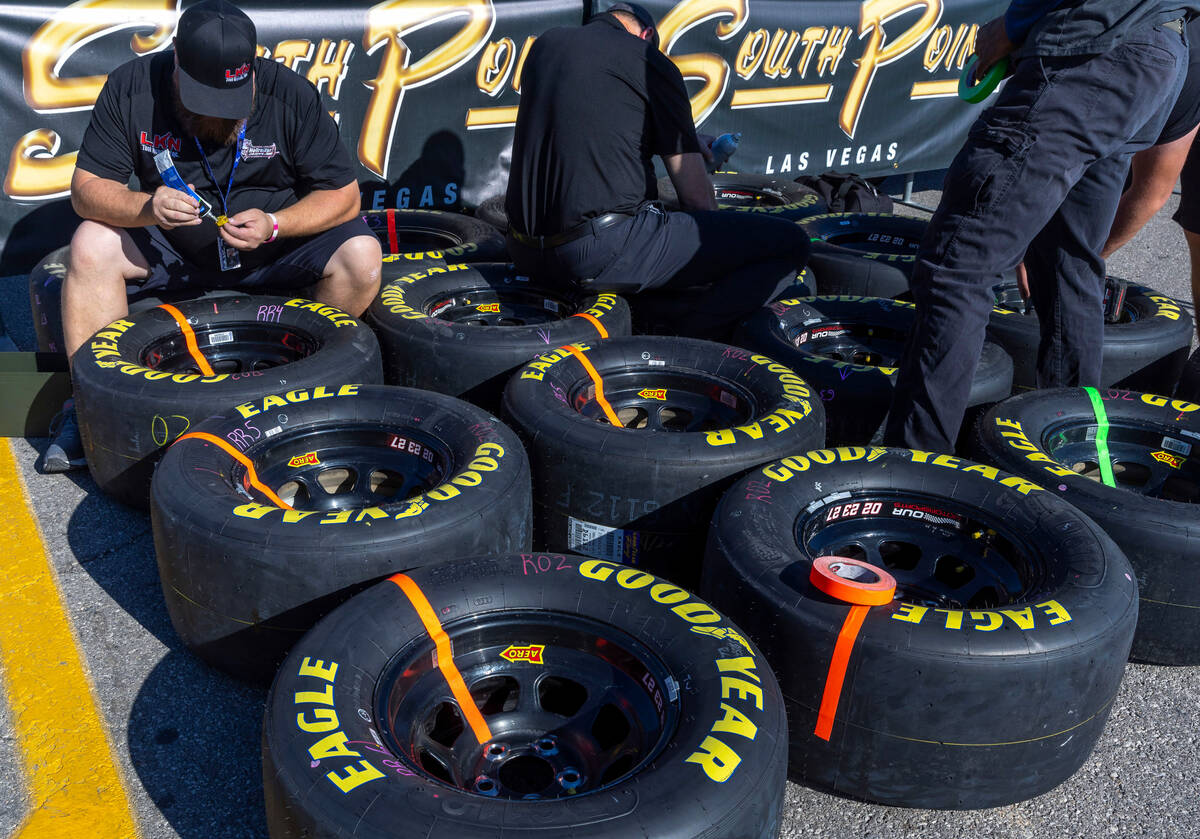 Tires are prepared for changes along pit row during the Alsco Uniforms 302 NASCAR Xfinity Serie ...
