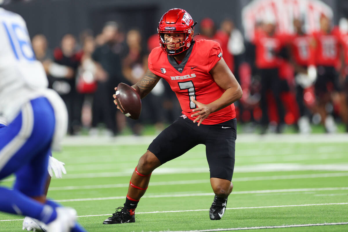 UNLV Rebels quarterback Cameron Friel (7) runs before fumbling the ball against the Air Force F ...
