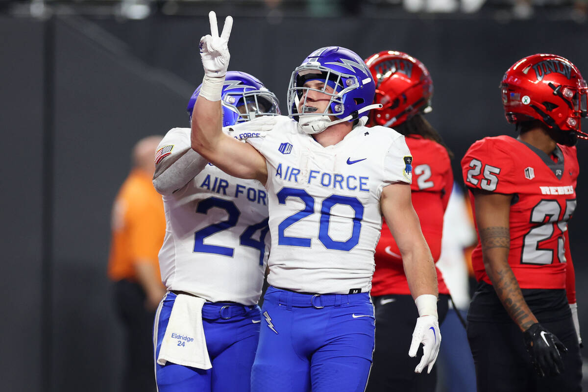 Air Force Falcons running back Brad Roberts (20) celebrates a touchdown against UNLV Rebels dur ...