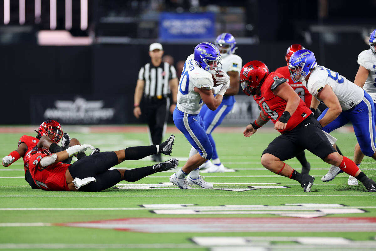 Air Force Falcons running back Brad Roberts (20) runs the ball against the UNLV Rebels during t ...