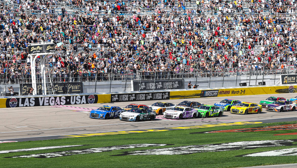 Drivers are seen during a late-race restart during the South Point 400 NASCAR Cup Series playof ...