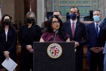 FILE - Los Angeles City Council President Nury Martinez at podium, and Mayor Eric Garcetti, sta ...
