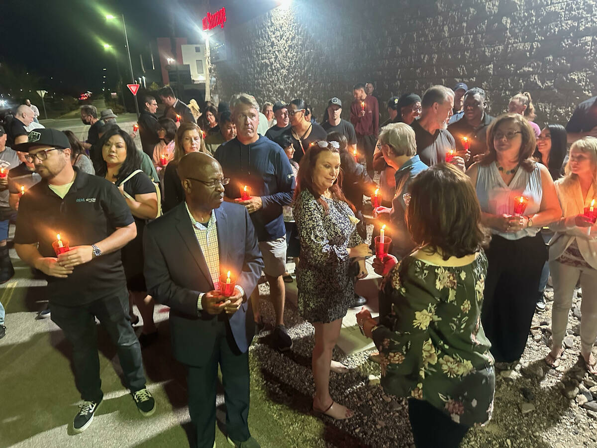 A candlelight vigil Sunday, Oct. 16, 2022, for critically injured first responder Mark Vobis ne ...