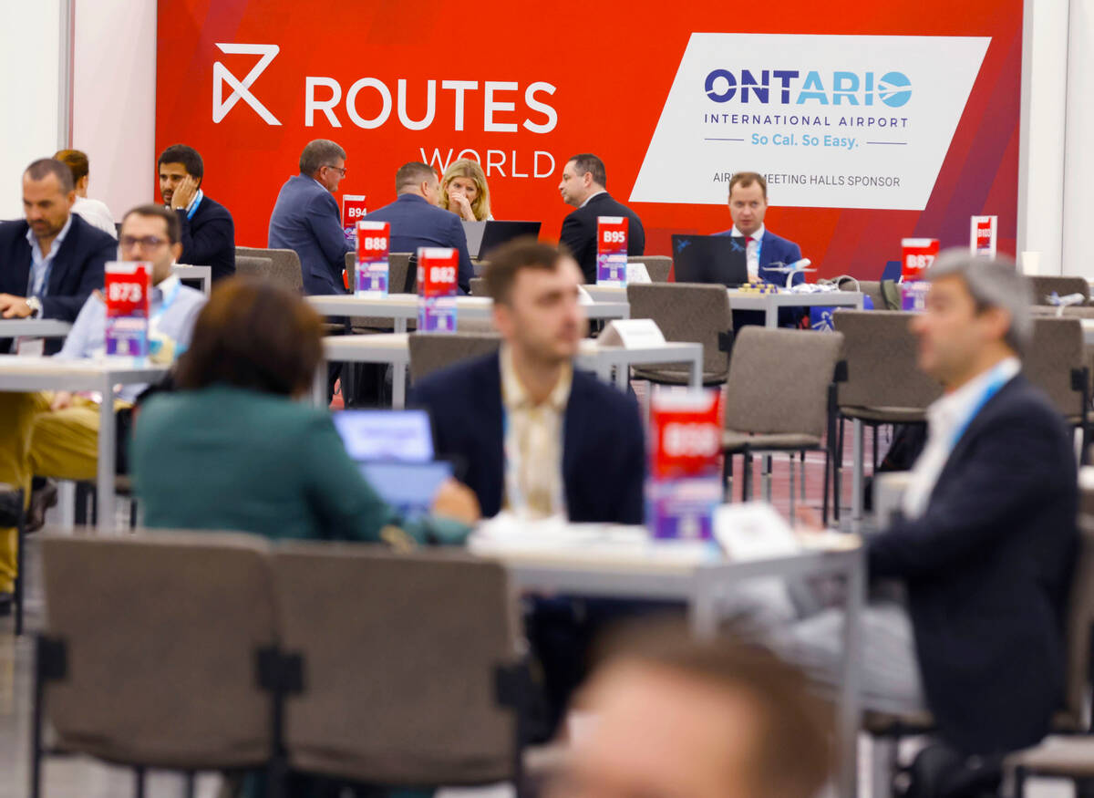 Forumgoers take a break during the 27th World Route Development Forum at the Las Vegas Conventi ...