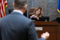 Judge Susan Johnson listens to Metropolitan Police Department attorney Matthew Christian during ...