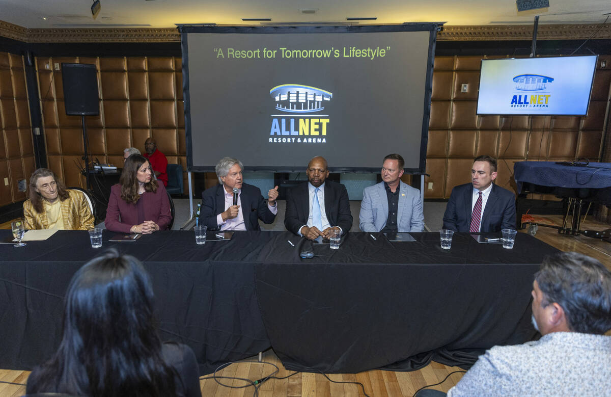 Ex-NBA player Jackie Robinson, center, holds a press conference to announce funding for his lon ...