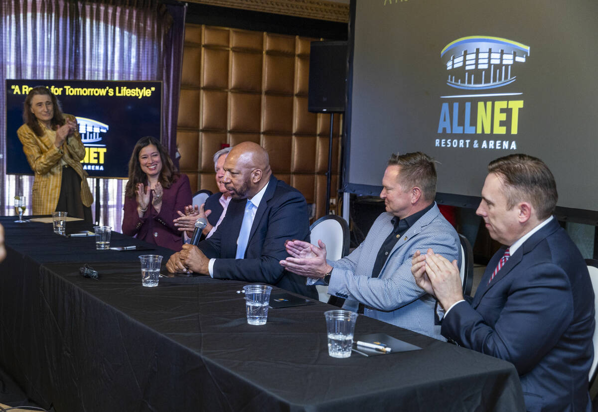 Ex-NBA player Jackie Robinson, center, holds a press conference to announce funding for his lon ...