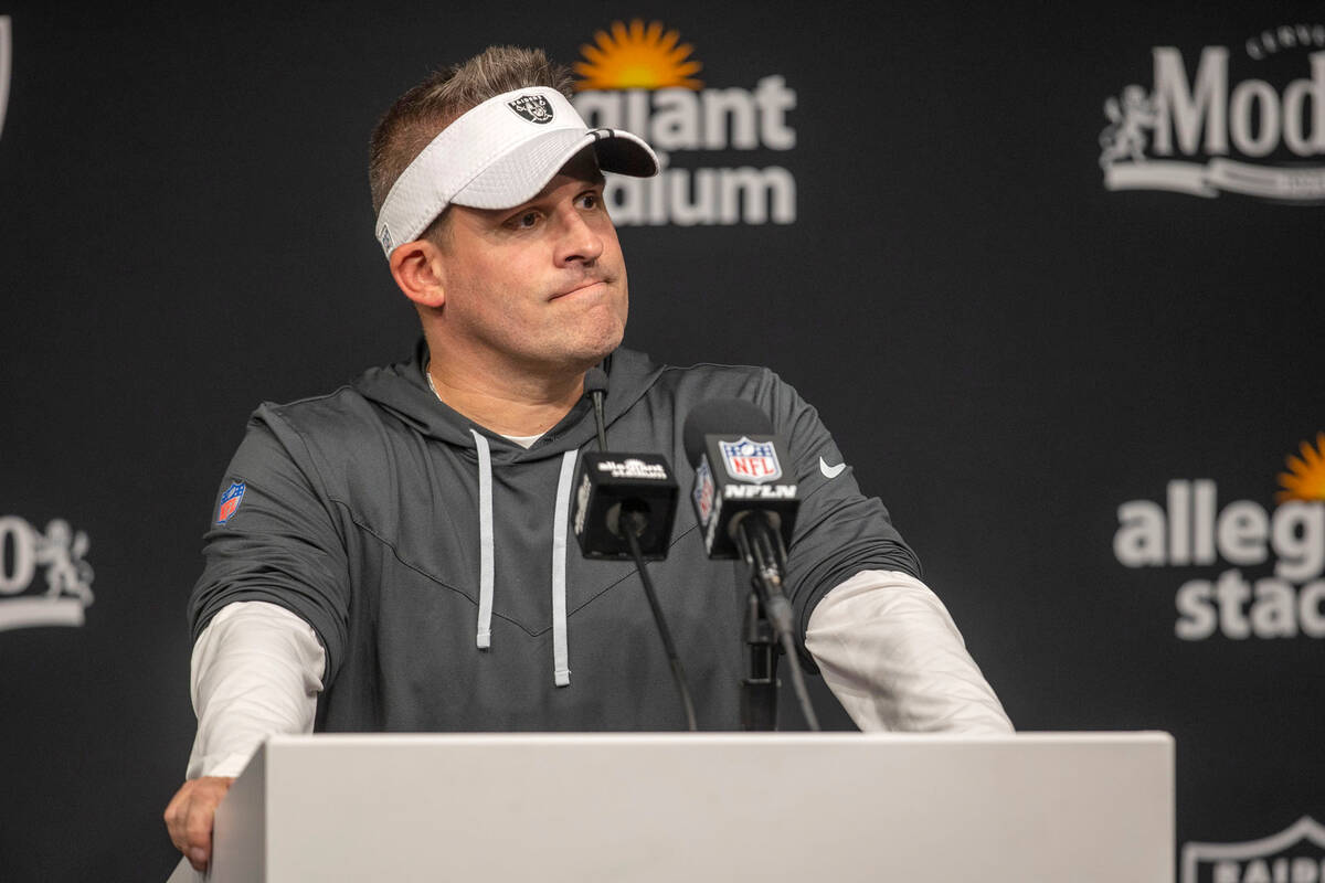Raiders head coach Josh McDaniels takes questions from the media during a news conference after ...