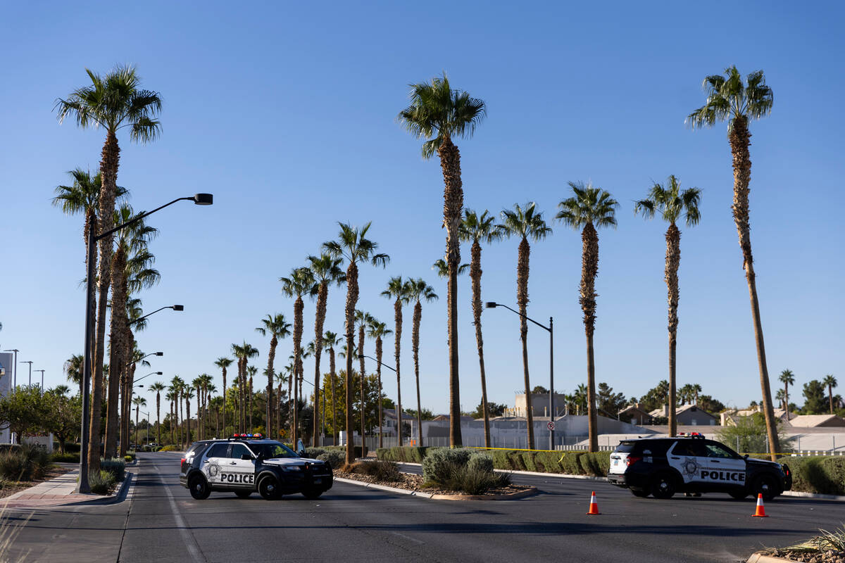 Las Vegas police officers investigate the scene of a fatal accident at the 5700 block of Centen ...