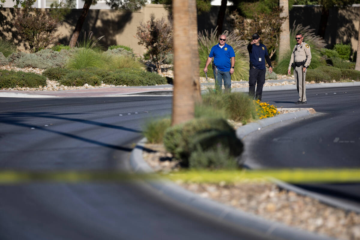 Las Vegas police officers investigate the scene of a fatal accident at the 5700 block of Centen ...