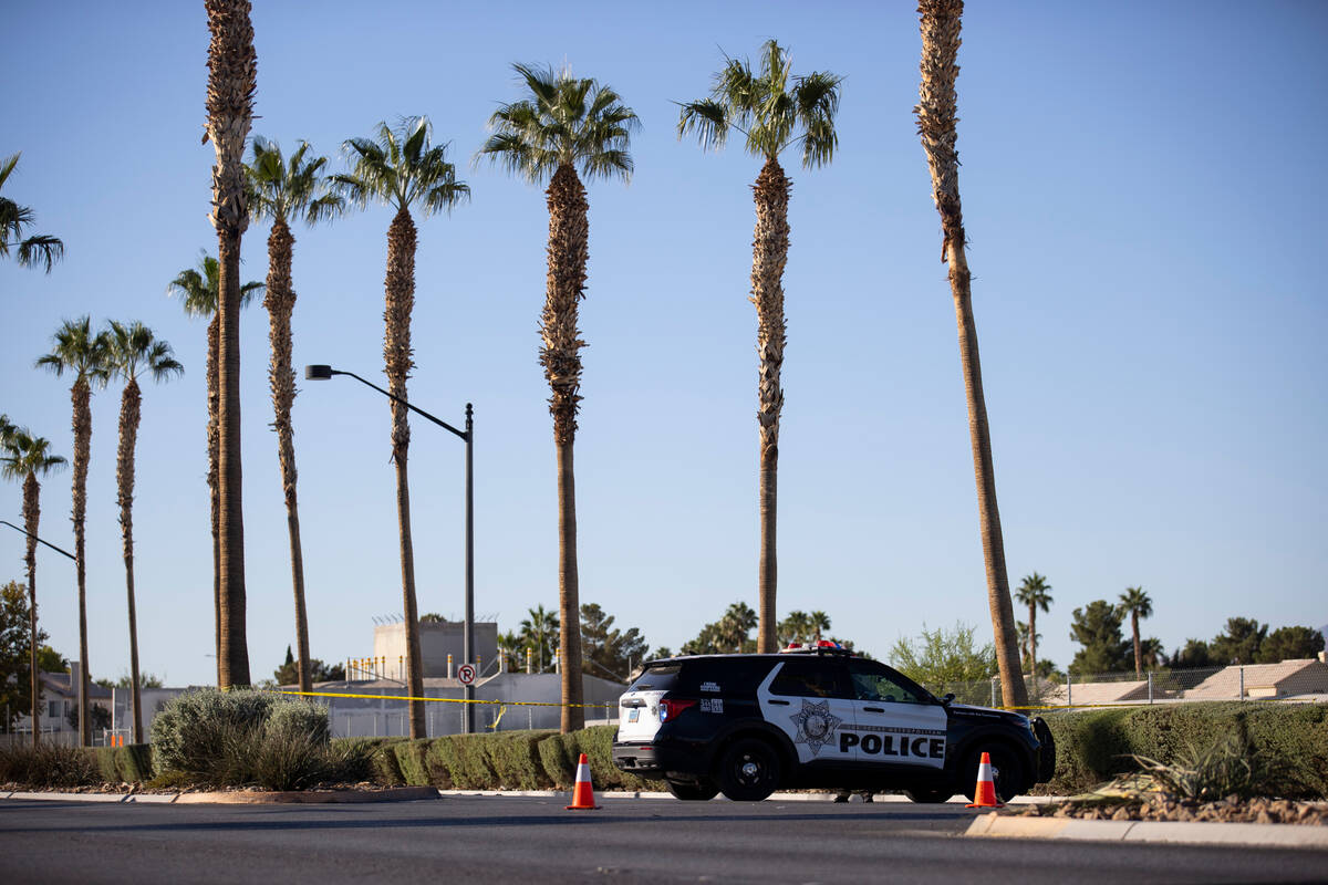 Las Vegas police officers investigate the scene of a fatal accident at the 5700 block of Centen ...