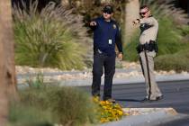 Las Vegas police officers investigate the scene of a fatal accident at the 5700 block of Centen ...