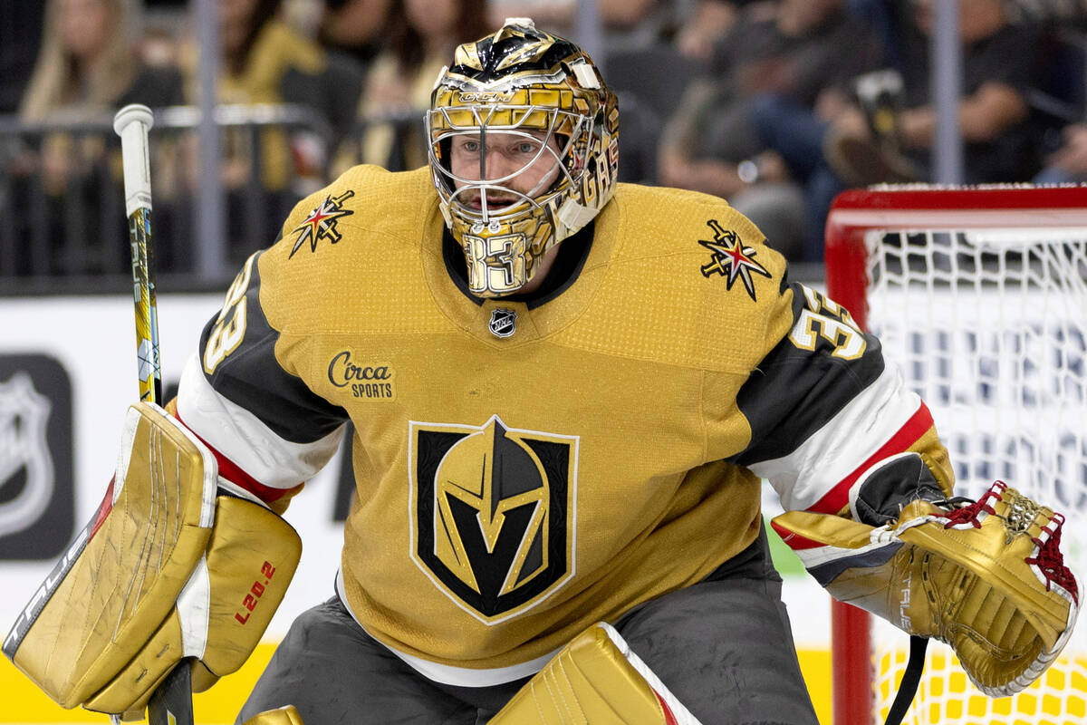 Golden Knights goaltender Adin Hill (33) anticipates the puck during the second period of an NH ...