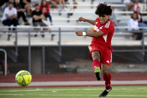 Coronado’s Francisco Avila kicks to score a goal against Rancho during a boys high schoo ...