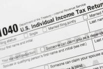 A portion of the 1040 U.S. Individual Income Tax Return form is shown July 24, 2018, in New Yor ...