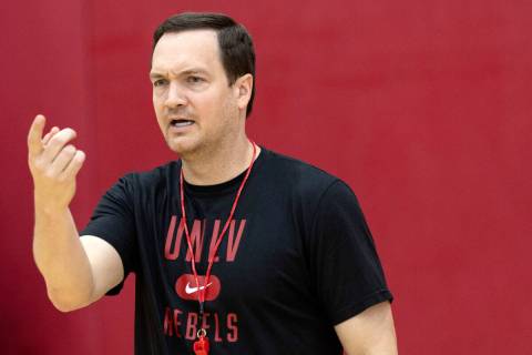 UNLV Rebels head coach Kevin Kruger signals from the sidelines during UNLV men's basketball&#x2 ...
