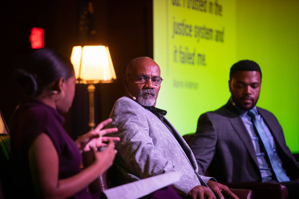 Shakala Alvaranga, left, asks a question while Marvin Anderson, center, and Anton Robinson list ...