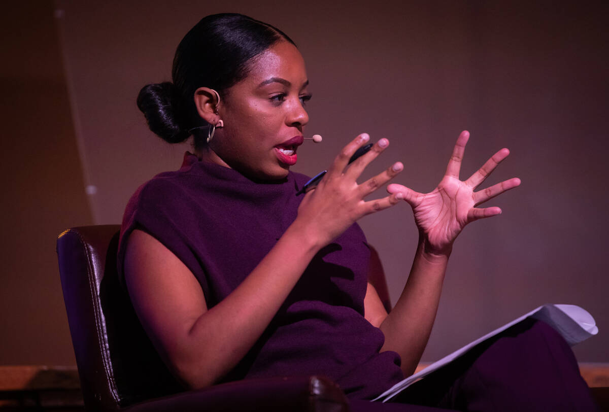 Shakala Alvaranga, moderator, asks a question of Marvin Anderson and Anton Robinson during an e ...