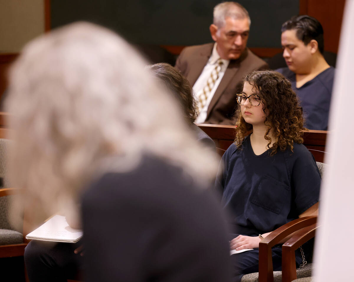 Sierra Halseth sits in court as Leslie Halseth, sister of murder victim Daniel Halseth, reads a ...