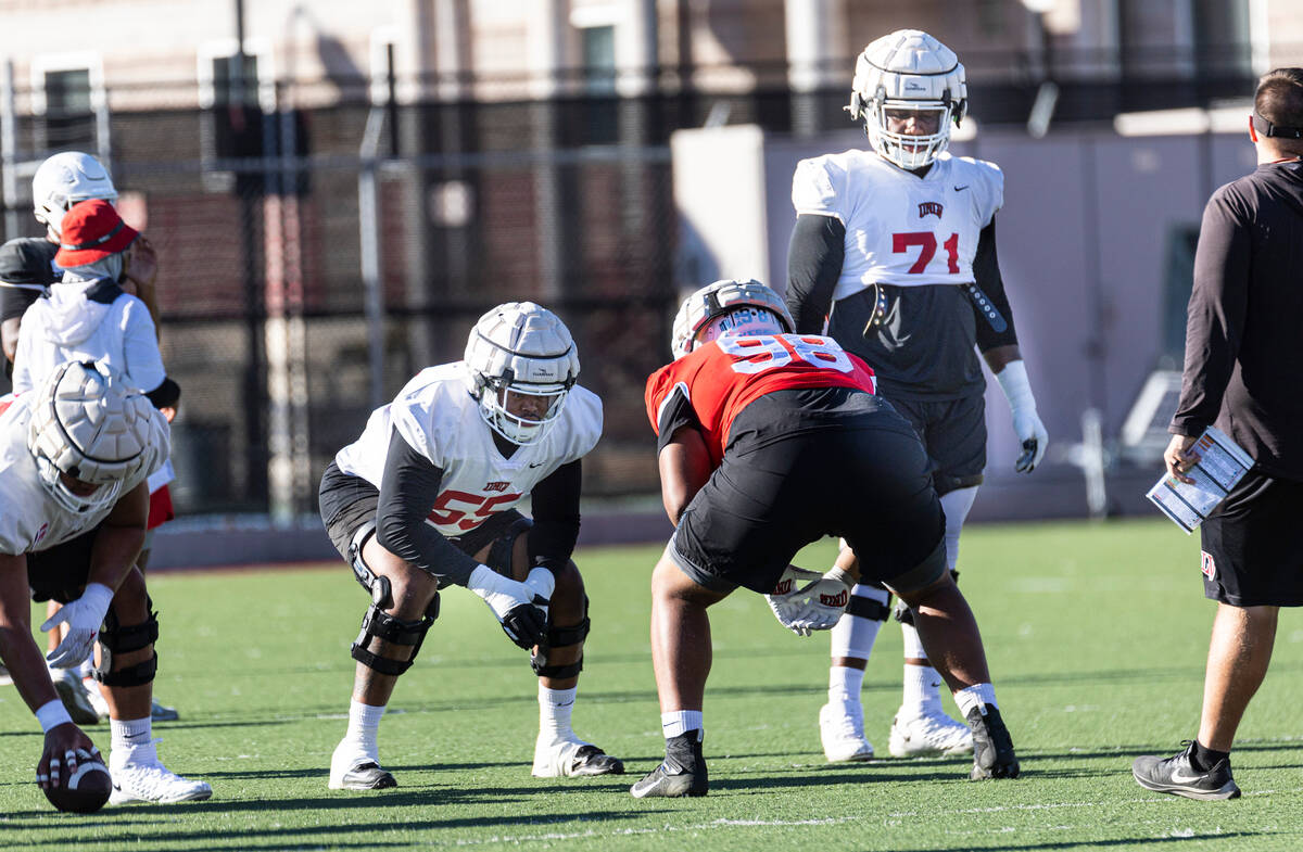 UNLV offensive linemen Preston Nichols (55) and Daviyon McDaniel (71) participate during footba ...