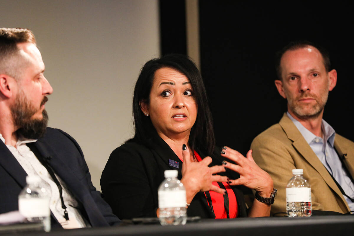 Christina Vela, chief executive officer of St. Jude's Ranch for Children, speaks as part of a p ...